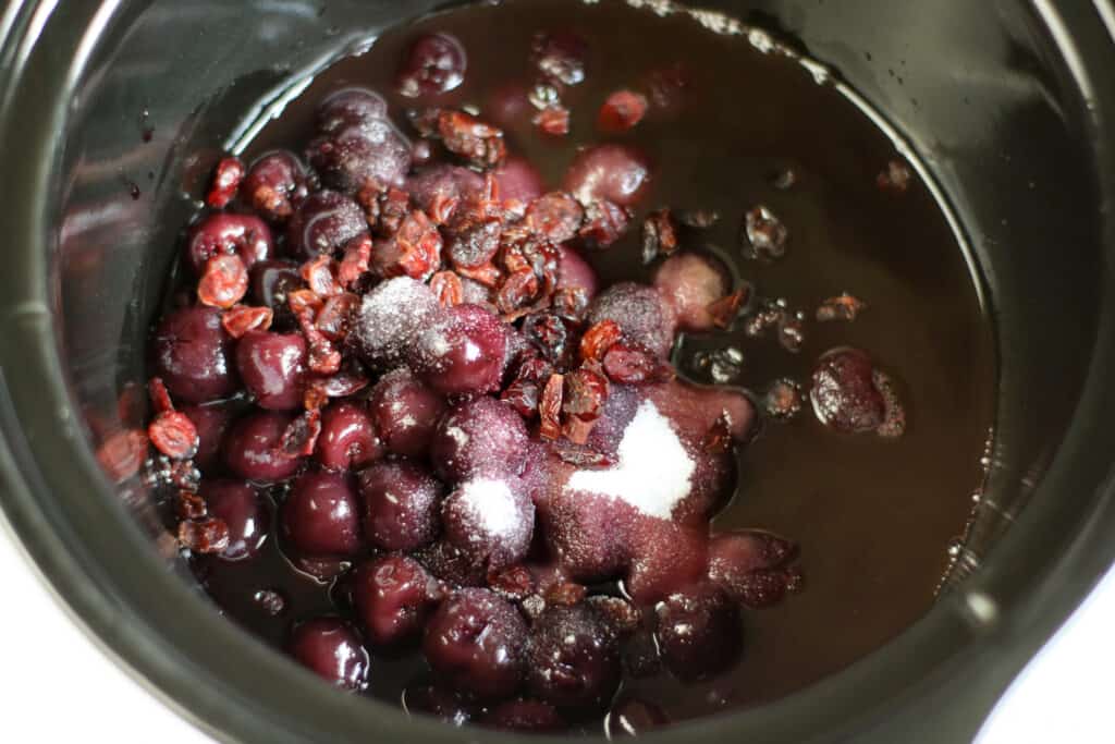 ingredients for cherries jubilee in a slowcooker