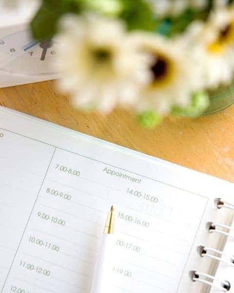 An appointment calendar on a desk.