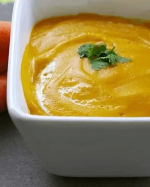 Homemade carrot bisque in a casserole dish.
