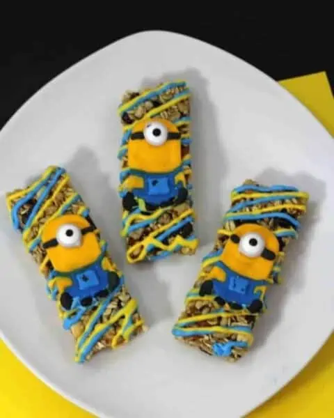 A white plan with three cooked Minion granola bars.