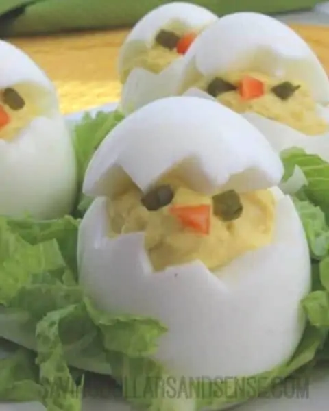 Deviled eggs shaped as baby chicks.