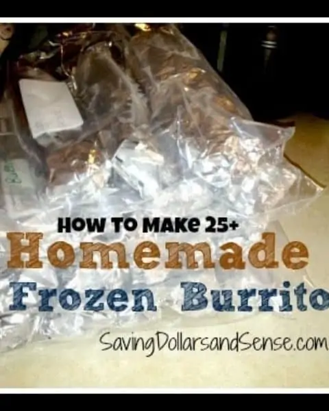 Homemade frozen burritos wrapped in aluminum foil.