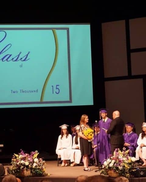 A young man graduating.