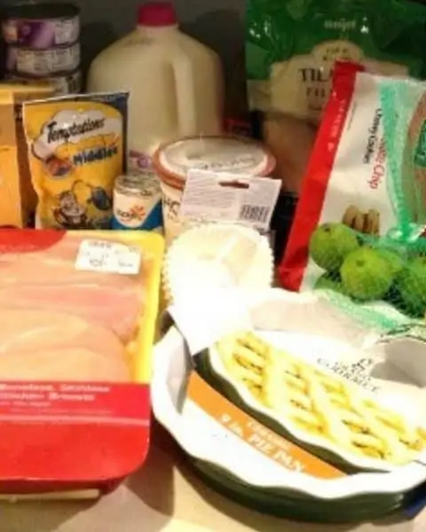 A variety of groceries and produce after going grocery shopping.