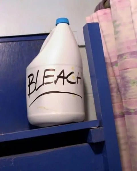 Bleach container on a cart.