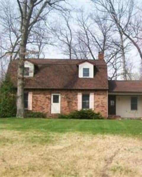 A view from a home with a clean front yard.