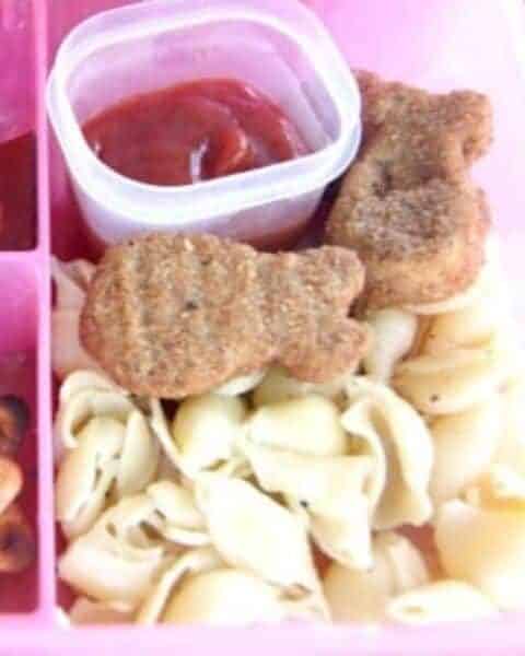 Ocean themed lunch, including chicken nuggets shaped like fish.