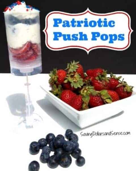 Homemade push pops with strawberries, whip cream, and berries.