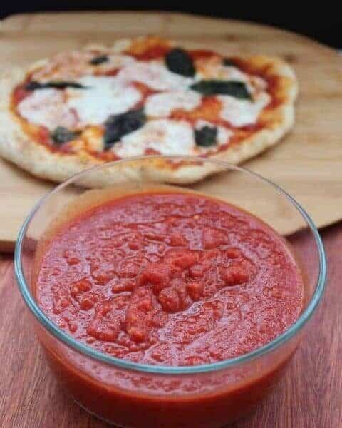 Bowl of homemade pizza sauce for a delicious homemade pizza.