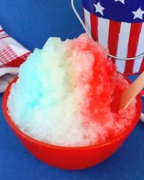 A red, white, and blue snow cone.