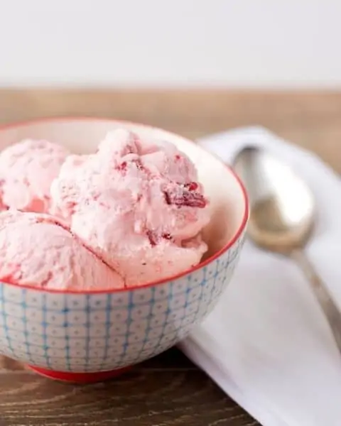 A small bowl of homemade strawberry ice cream.