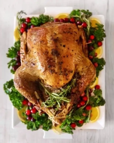 Baked Thanksgiving turkey on a platter.