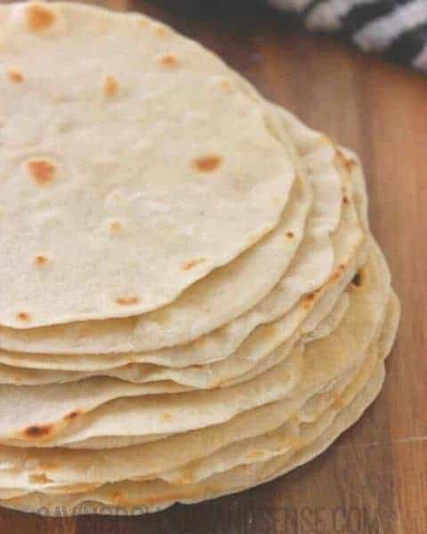 Stack of homemade flour tortillas.