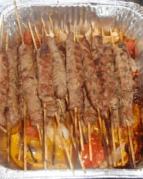 A bundle of cooked kebabs.
