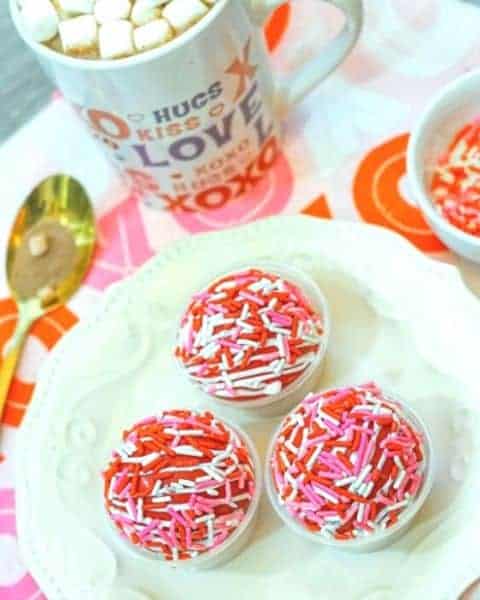 Hot coco bomb ingredients and hot chocolate drink.