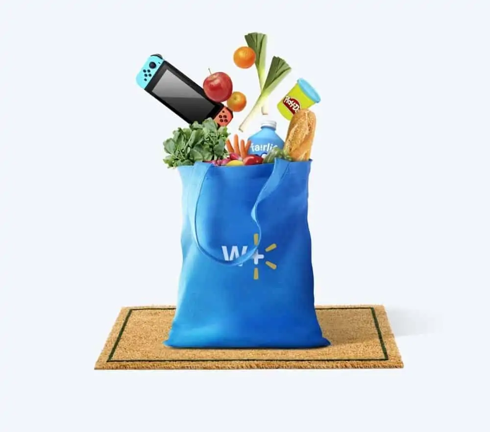 A blue Walmart Plus bag filled with groceries, a game system and toys. 