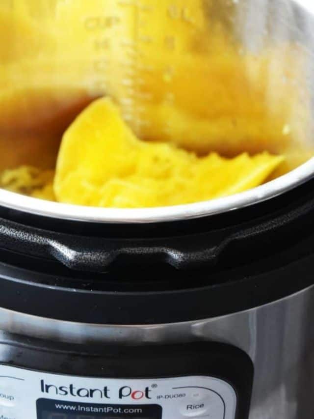 An instant pot with a spaghetti squash inside.