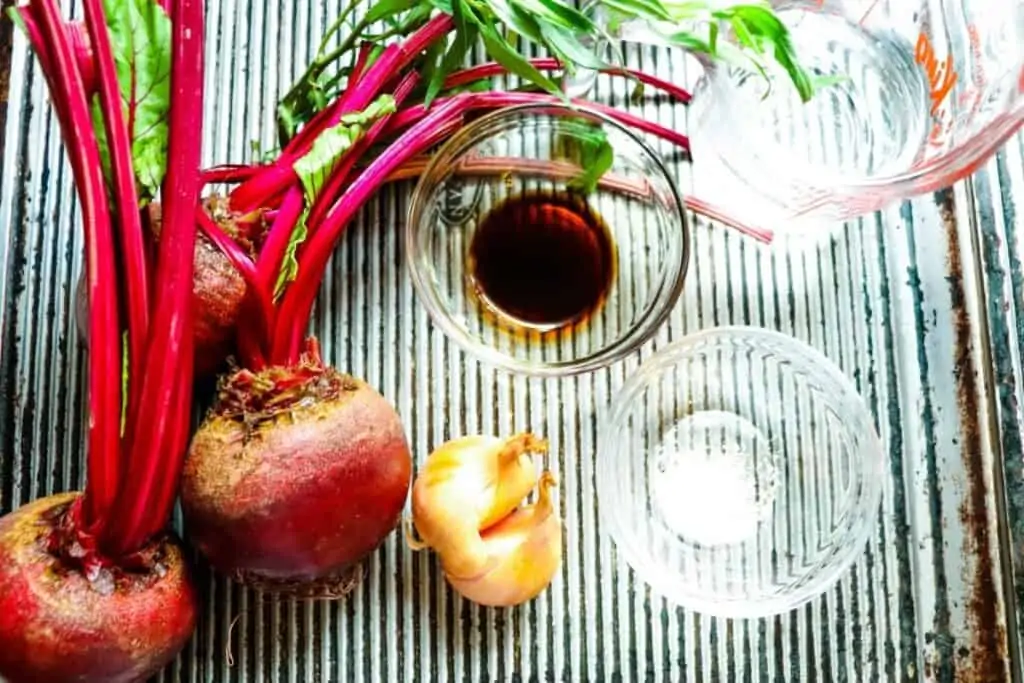 Beets, garlic, and ingredients for pickled beets.