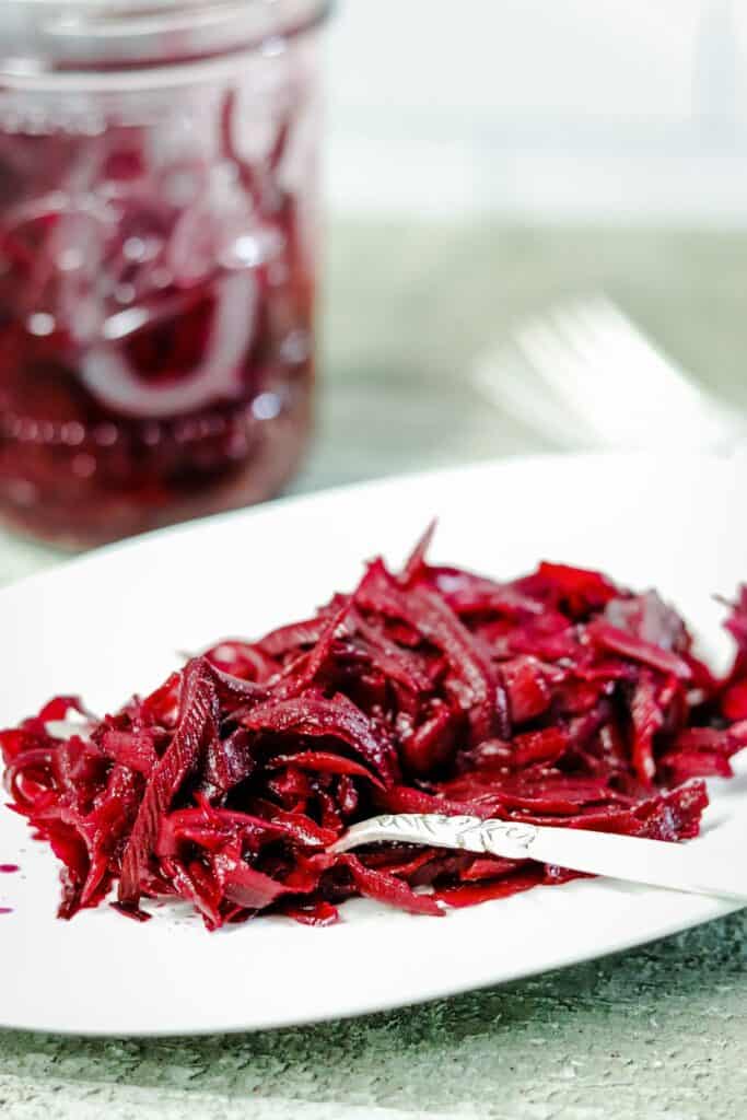 Pickled beets on a plate.