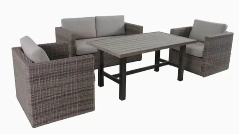 Outside patio furniture with table, couch, and chairs.