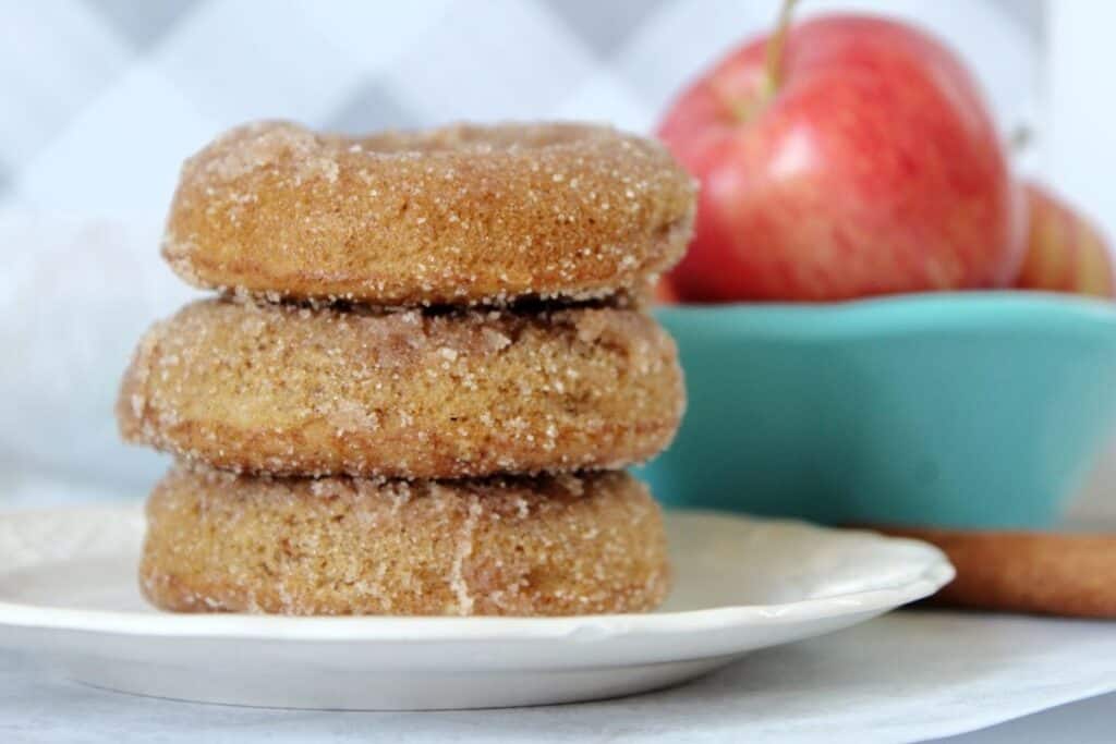 A stack of baked apple cider donuts.
