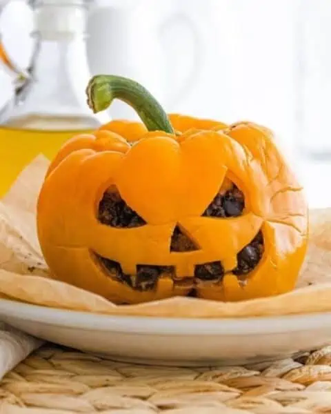 Cooked stuffed pepper that's decorative for Halloween.