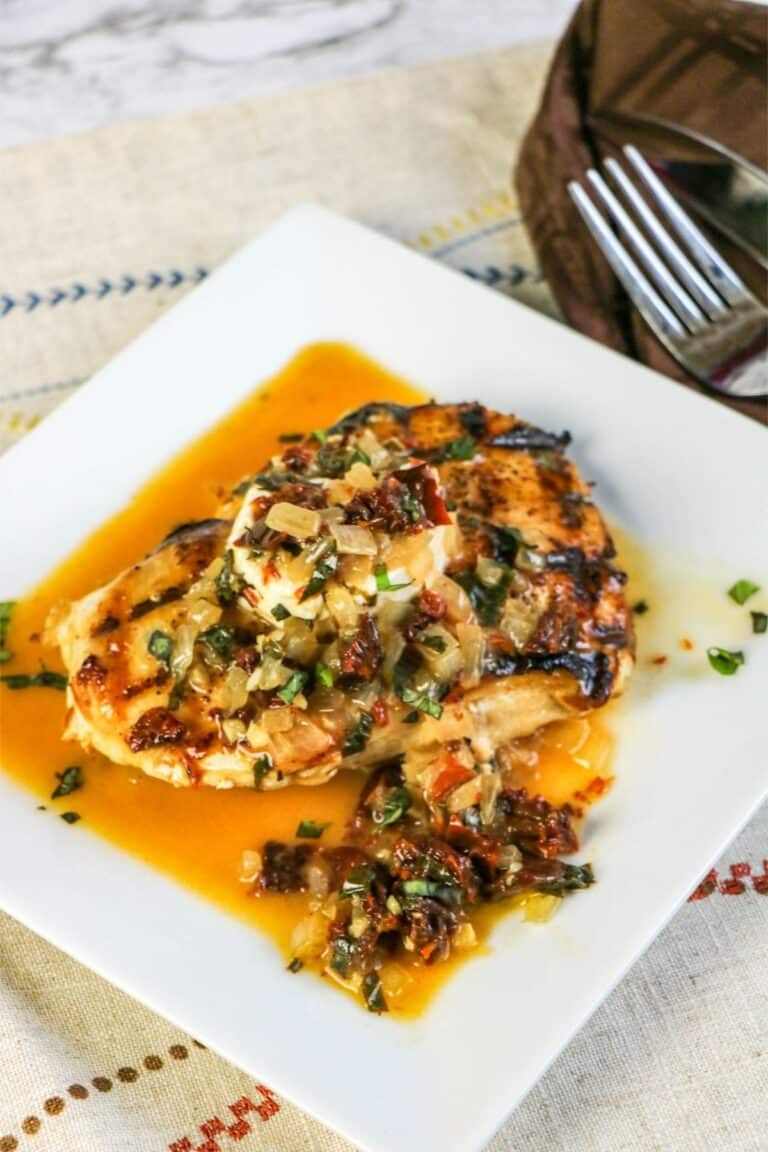 White plate of copycat Carrabba's chicken bryan.