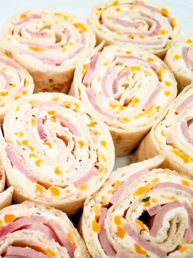 Closeup of ham and cheese pinwheel sandwiches.