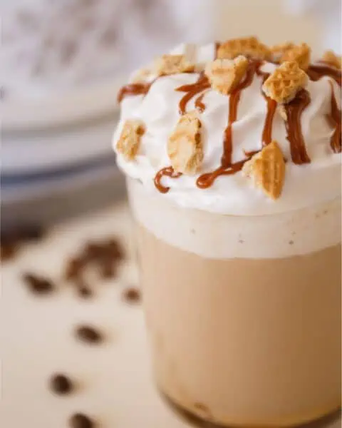 Whip cream, caramel drizzle, and garnishing toppings for a copycat caramel brulee lattes.