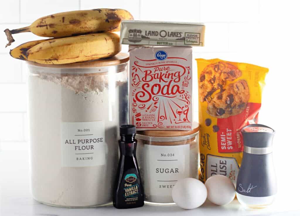 Ingredients for Banana Chocolate Chip Muffins Recipe displayed on a counter top.