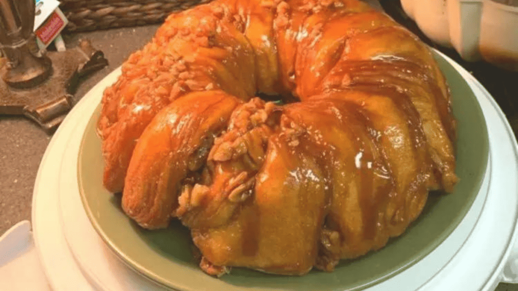 Ooey, gooey pull apart cinnamon rolls on a plate. 