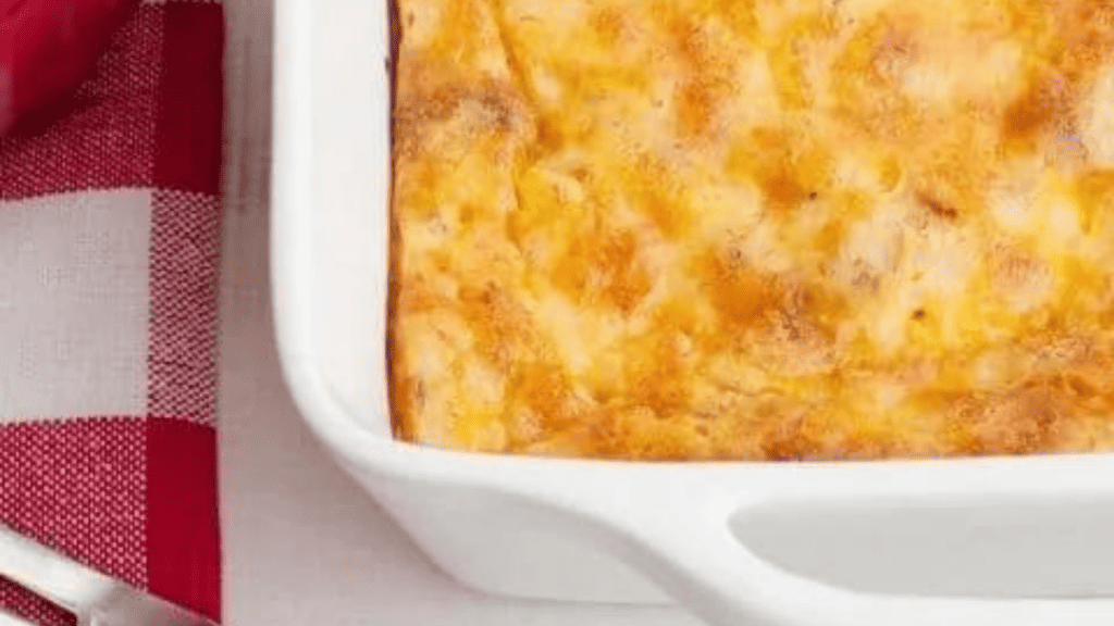 A casserole filled with bacon, cheese, mushrooms and scrambled eggs.