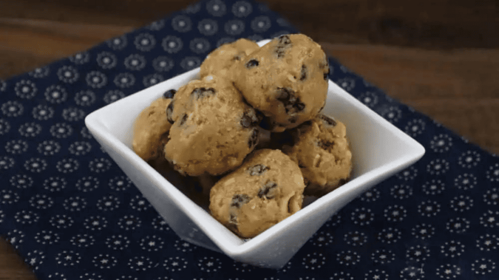 a bowl of no bake energy bite balls.