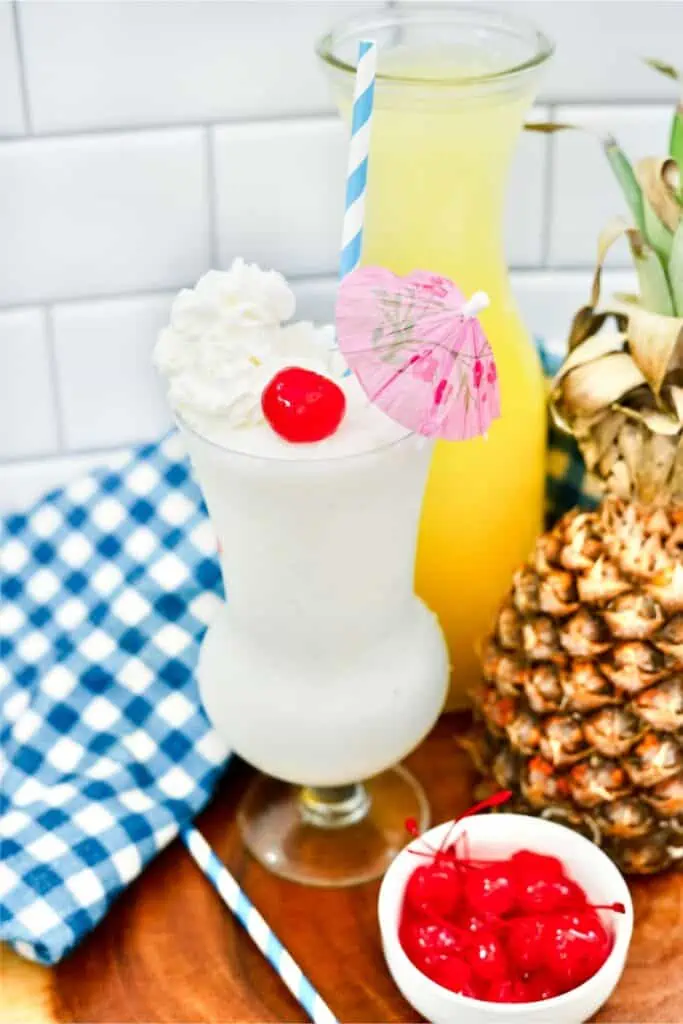 A refreshing virgin Pina Colada milkshake topped with a cherry.