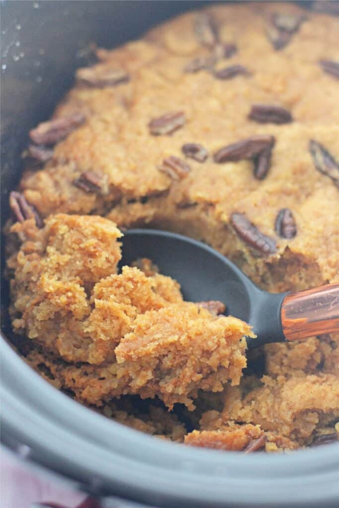 A pumpkin cobbler recipe prepared in a crock pot.