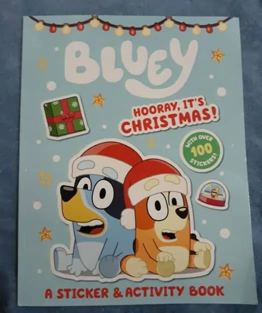 Bluey's Christmas sticker & activity book with October 14th deals.