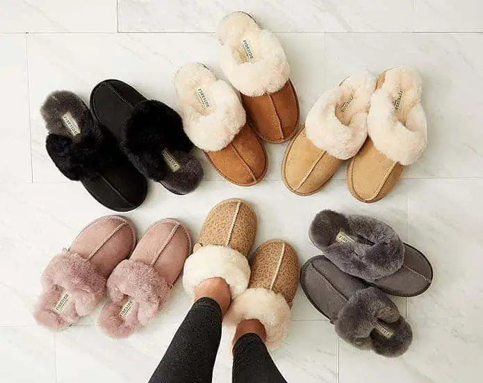 On November 24th, shop amazing Deals on a woman's feet arranged in a circle with different colored slippers.