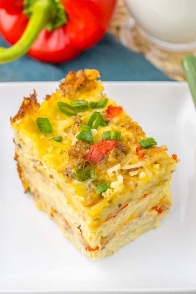 A slice of Slowcooker breakfast casserole on a white plate.