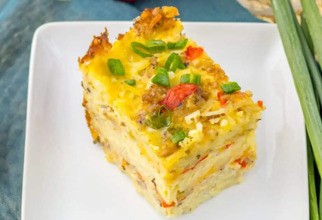 A delicious Slowcooker breakfast casserole served on a white plate.