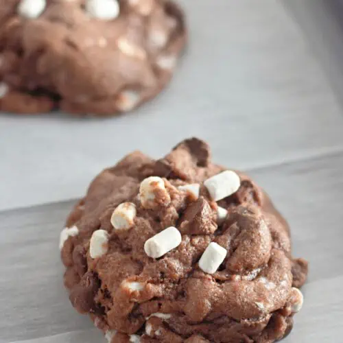 Peppermint hot cocoa s'mores cookies on a baking sheet.