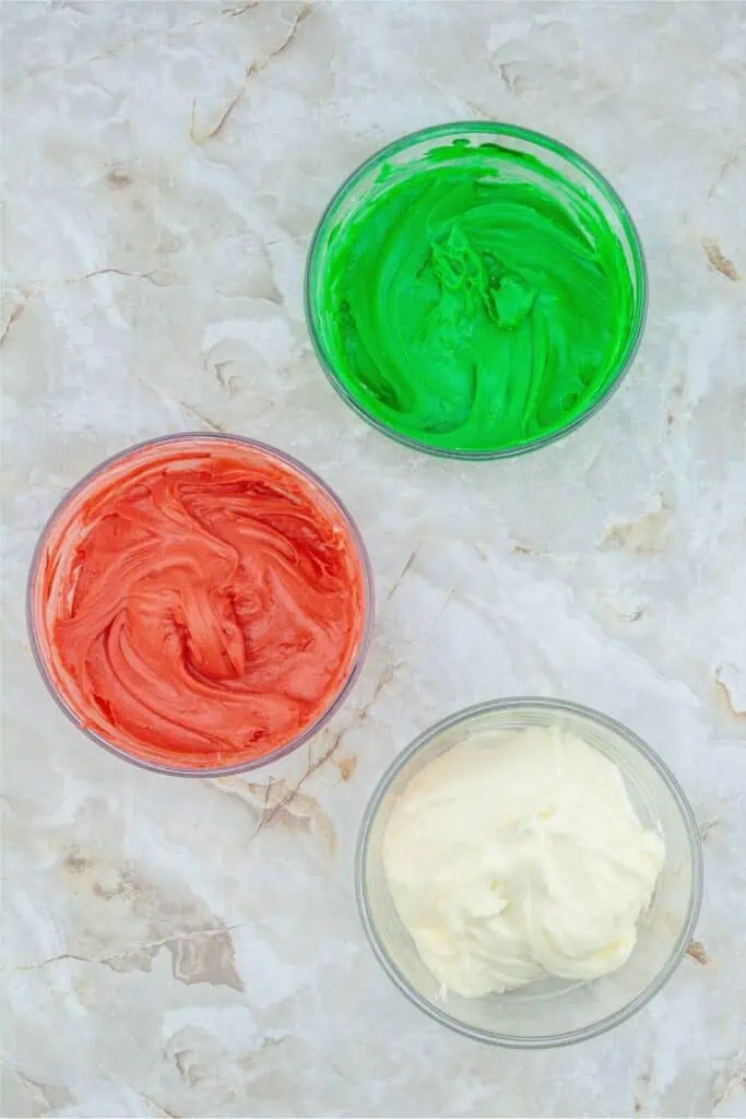 Three bowls of red, green and white icing beautifully complement the homemade creamy peppermints.