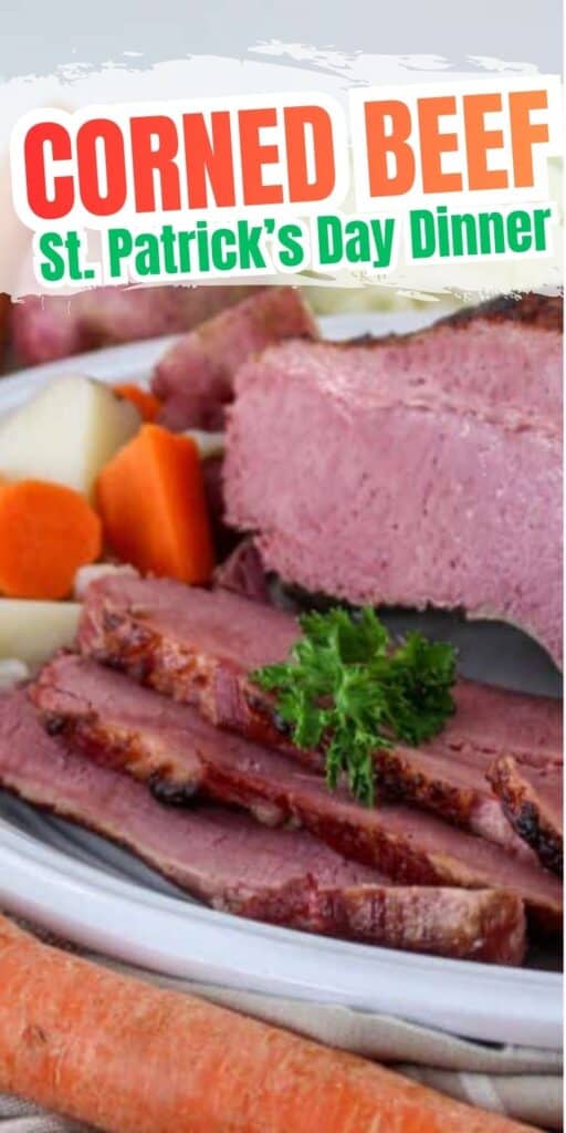 Sliced corned beef served on a plate with cooked carrots and potatoes, garnished with parsley; text reads "Dutch Oven Corned Beef and Cabbage St. Patrick’s Day Dinner.