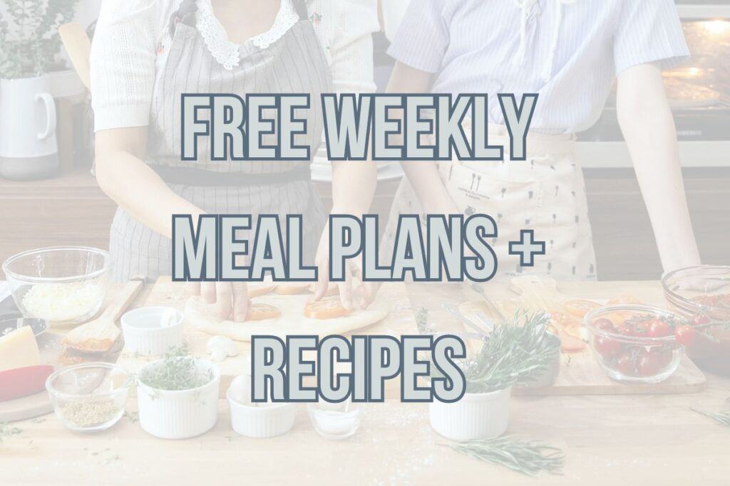 Two individuals preparing food on a kitchen counter with text overlay saying "free weekly meal plans + recipes".