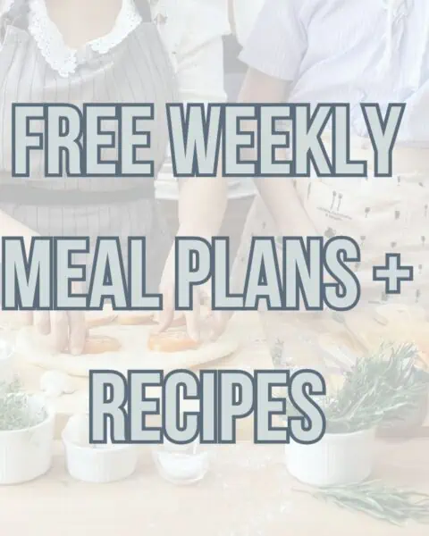 Two individuals preparing food on a kitchen counter with text overlay saying "free weekly meal plans + recipes".