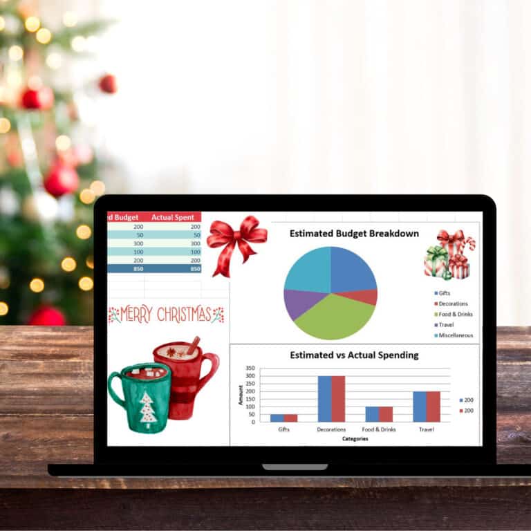 A laptop on a wooden table displays a colorful holiday budget breakdown with a pie chart, bar graph, and festive decorations. A Christmas tree is blurred in the background.