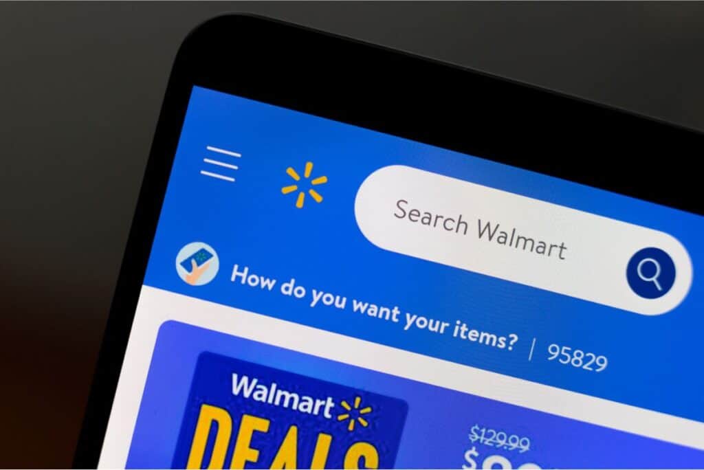 A digital device showcasing the Walmart app interface highlights a search bar and a section for promotional deals, including options to shop free with special offers.