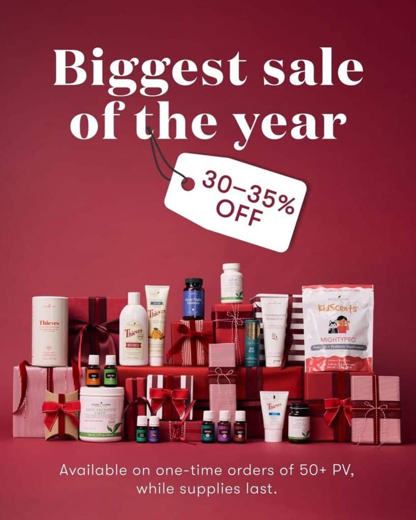 A variety of health and wellness products are displayed with gift bows, promoting a “Biggest sale of the year, 30-35% off” offer on a red background—don’t miss these exclusive Young Living Black Friday Deals!.