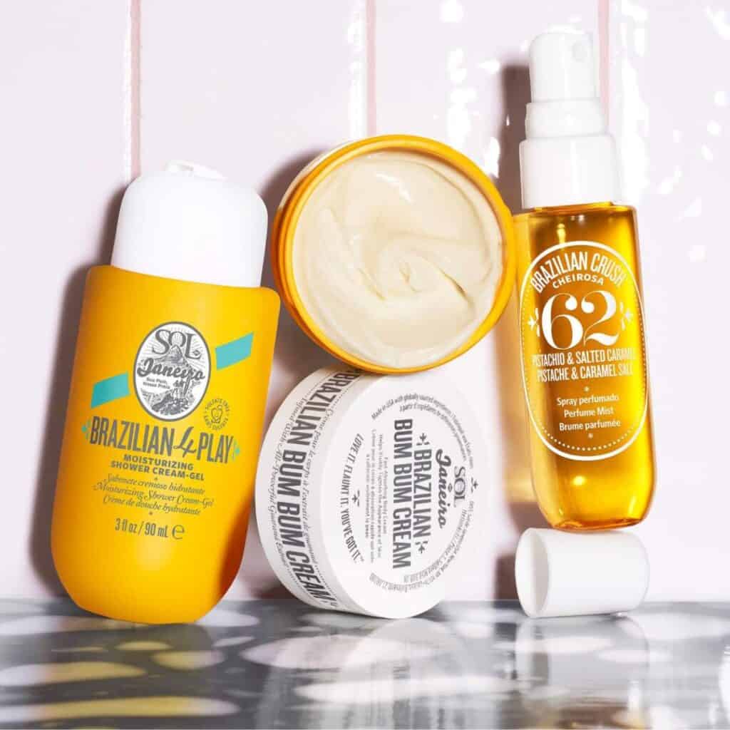 A collection of Sol de Janeiro skincare products, featuring containers and a spray bottle, beautifully displayed on a white surface. Perfect for any beauty ritual, these favorites often found at Sephora bring the essence of Brazilian Bum Bum to your routine.
