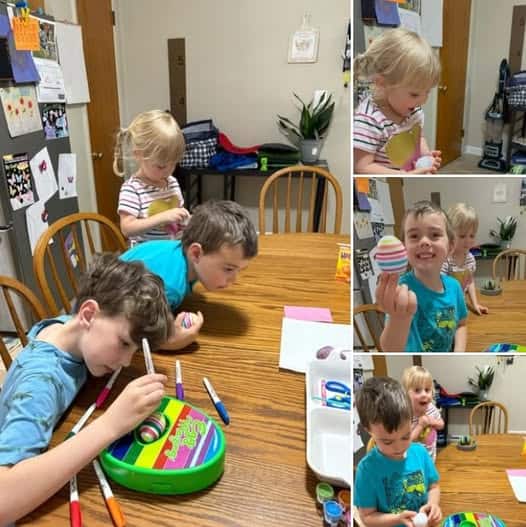 Three children sit at a wooden table coloring eggs with markers in this personal post. Inset photos show the kids proudly holding and displaying their decorated eggs.