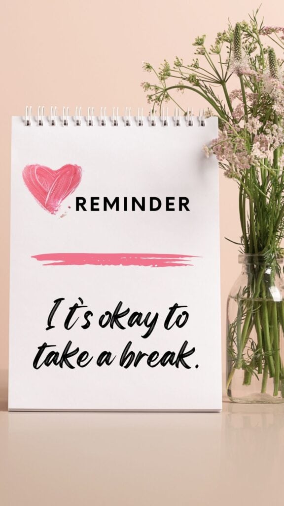 It's okay to take a break," next to a vase of delicate flowers—a gentle personal post encouraging self-care.